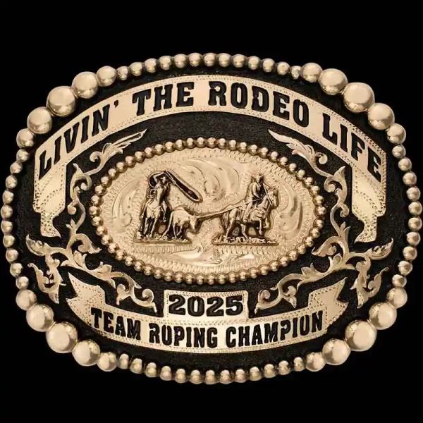 Our Vernal Belt Buckle radiates true tradition.
Handcrafted on a German Silver base, it features a beaded edge adorned with Jeweler's Bronze overlays and ribbon-ended banners on the top and bottom. What makes this buckle special is the hand-engraved bead
